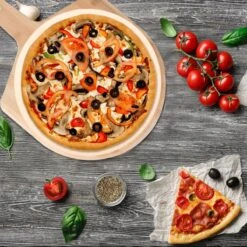 MaxxHome Pizzasteen - BBQ Steen - Maximum Te Verhitten Tot 600 Graden - ⌀33 - Incl. Houten Schep -The Bastard Winkel 1200x1200 577